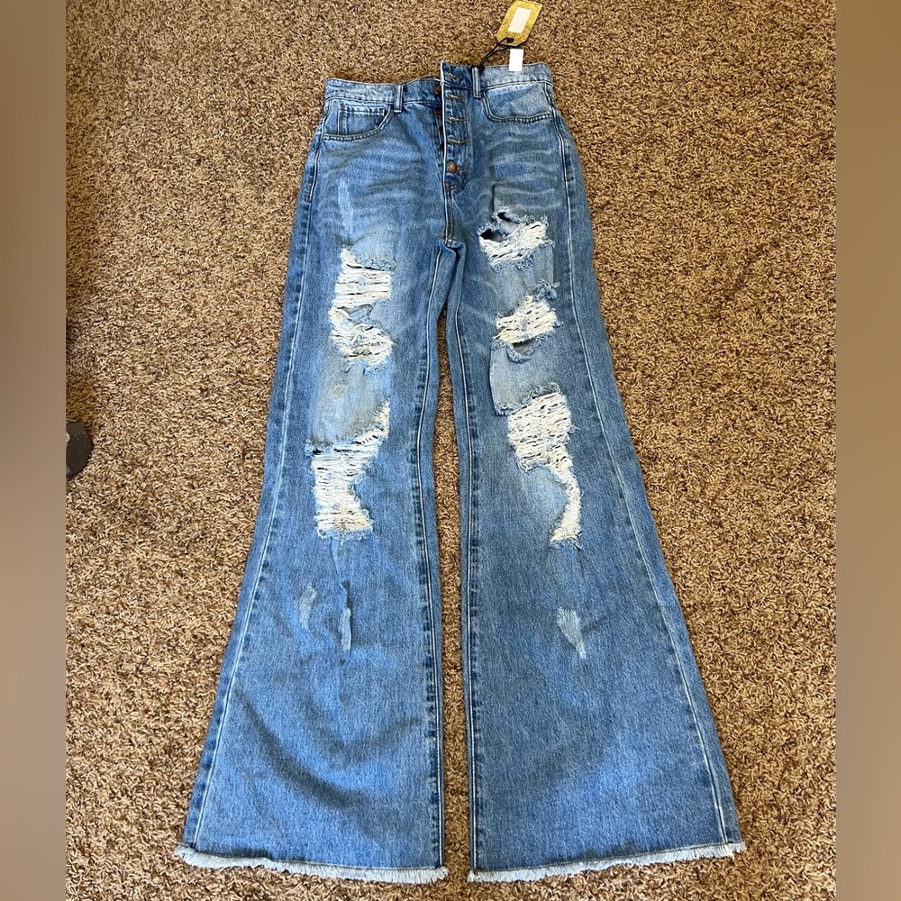 Vibrant jeans size 9 brand new!